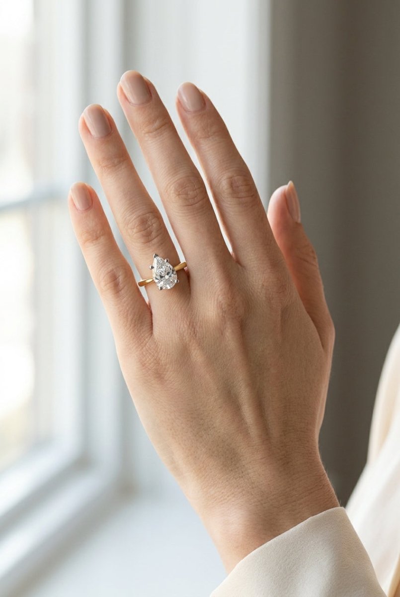 4 carat pear lab grown diamond engagement ring - full hand scale