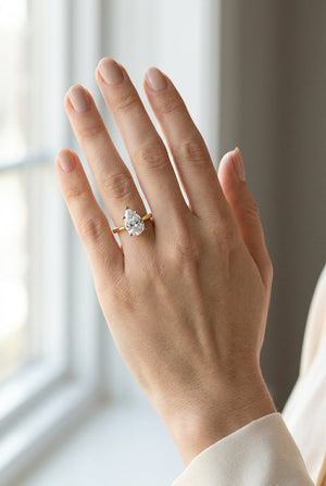 4 carat pear lab grown diamond engagement ring - full hand scale