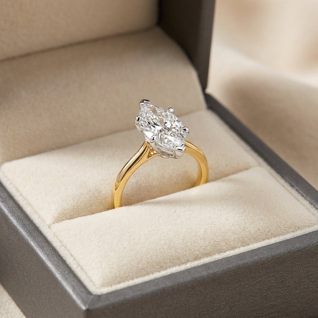RM12604C-LD marquise engagement ring in presentation box