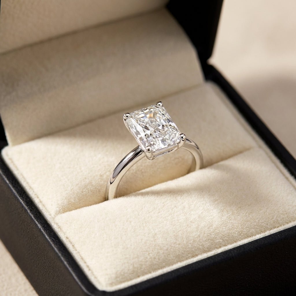 RM12613C-WLD radiant engagement ring in presentation box