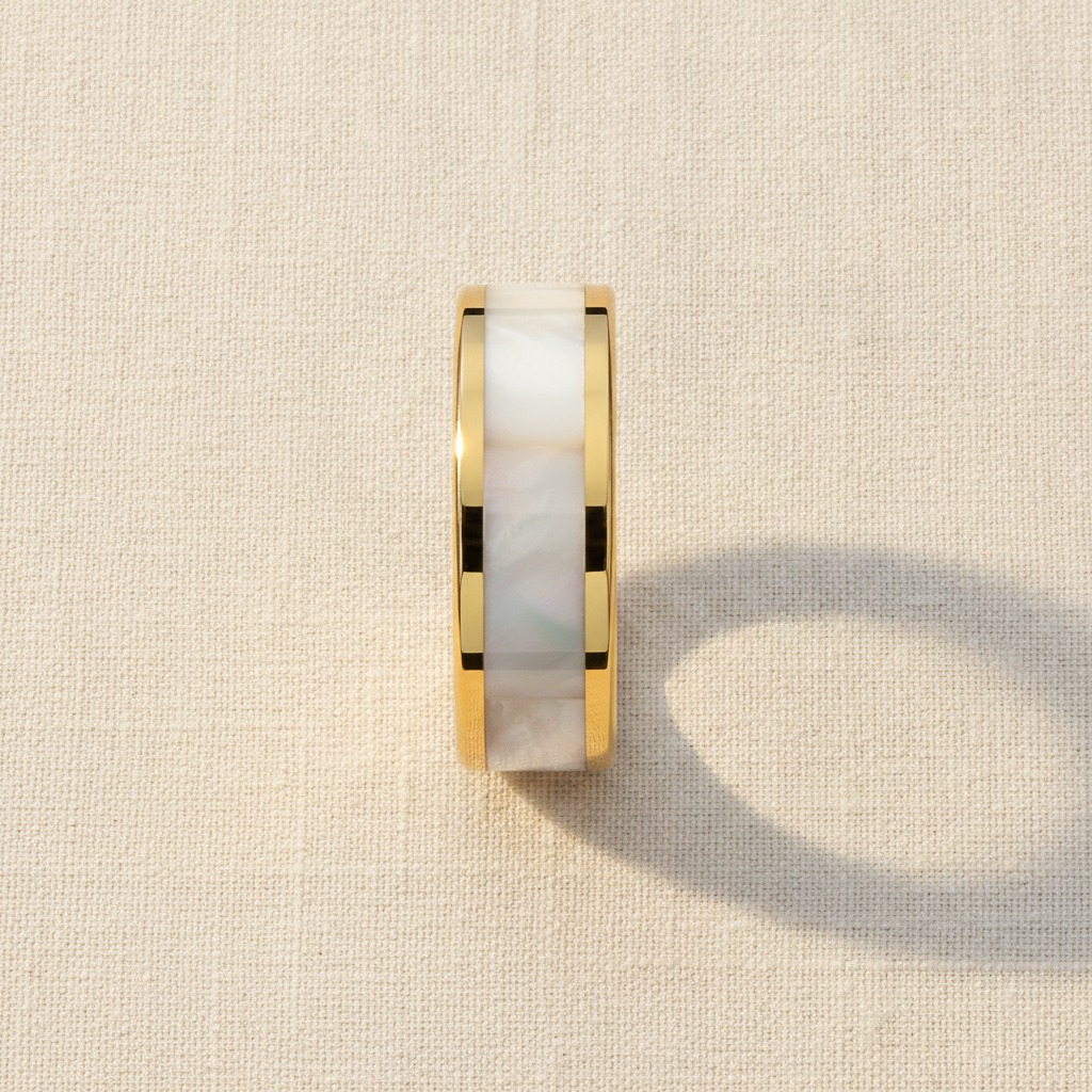 GRACE gold-plated tungsten wedding band with real white abalone shell inlay macro detail overhead flat lay