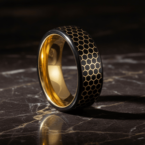 ALTIN — Luxury 3/4 angle on dark marble — men's tungsten wedding ring.