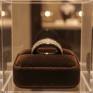 AMANA — Premium boutique display on velvet — men's tungsten wedding ring.