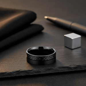 ARAE — Editorial masculine still life — men's tungsten wedding ring.