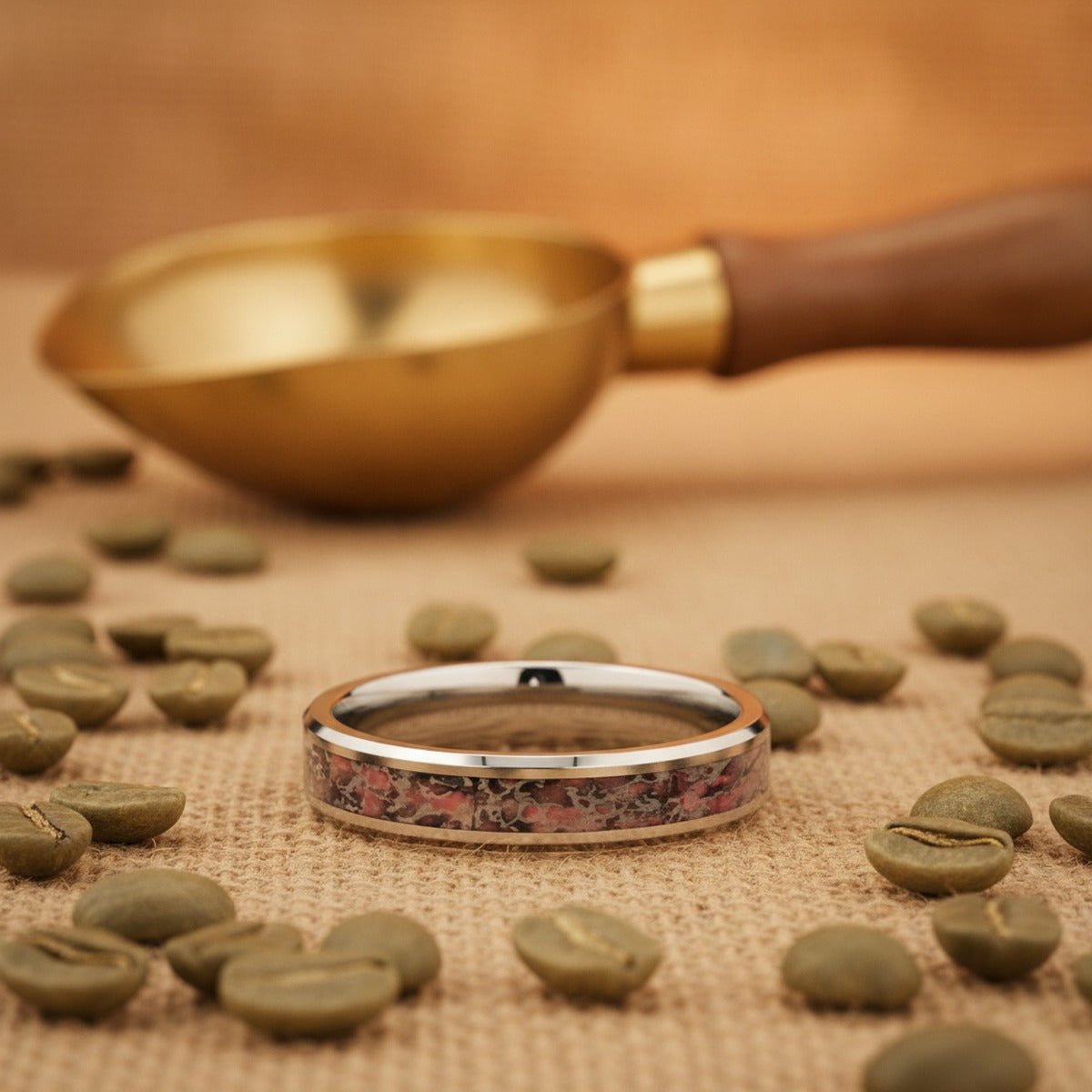 Aydins ARCHEAN | Pink Dinosaur Bone Tungsten Wedding Band lifestyle scene, coffee roaster