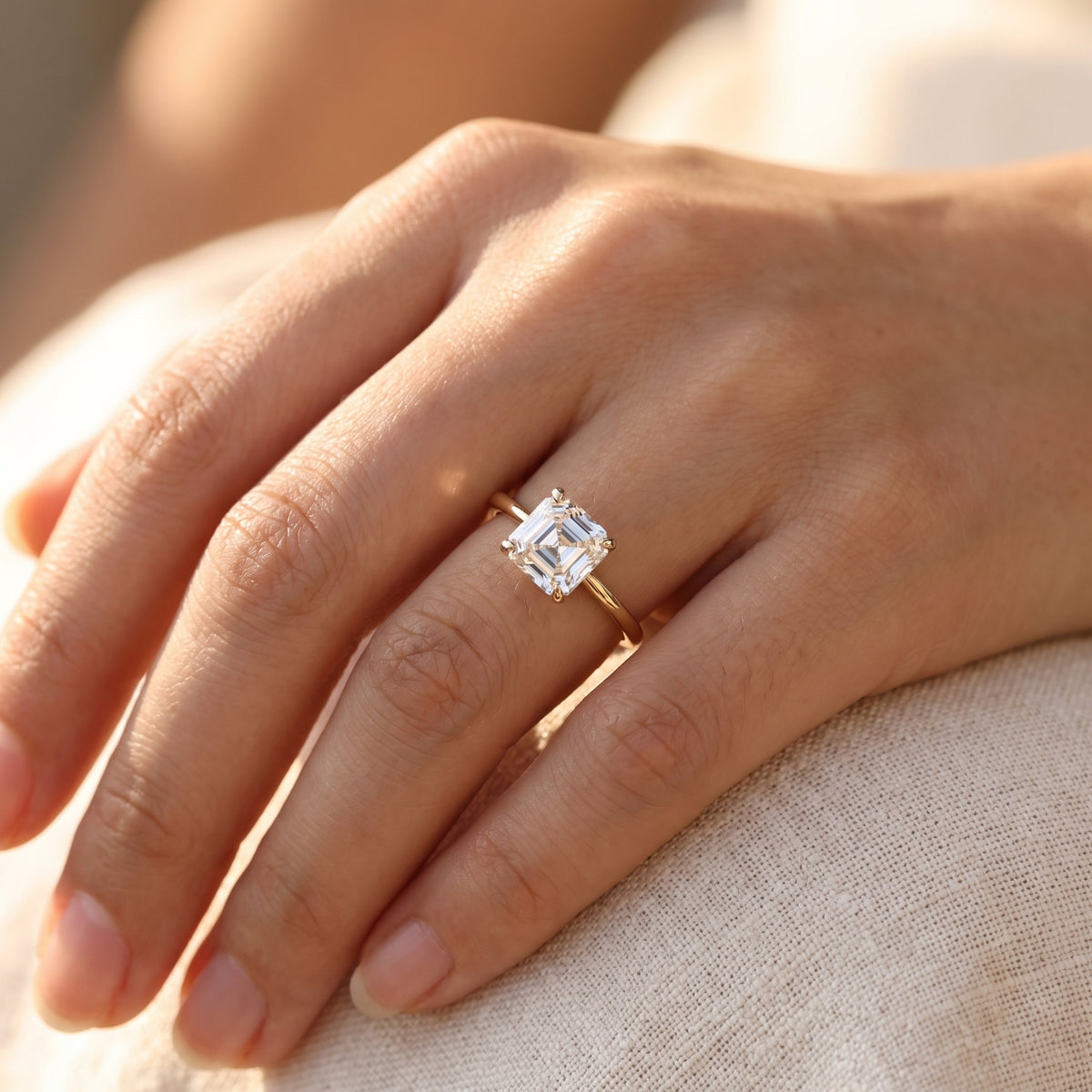 Asscher lab-grown diamond solitaire engagement ring, Yellow Gold, lifestyle photograph