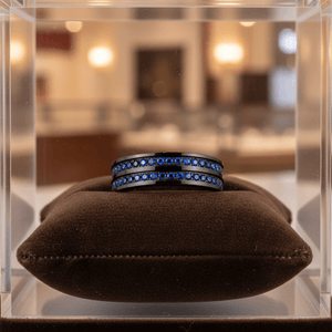 AZURON — Premium boutique display on velvet — men's tungsten wedding ring.
