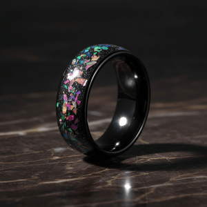 BALATON — Luxury 3/4 angle on dark marble — men's tungsten wedding ring.
