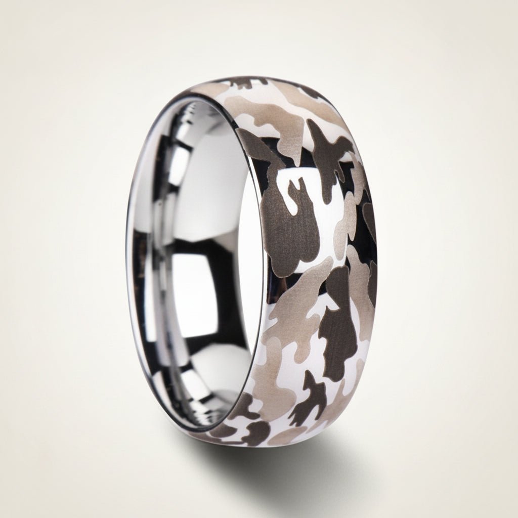 BATTALION domed silver tungsten carbide wedding band with laser engraved camouflage pattern running around the band and polished edges, studio hero shot