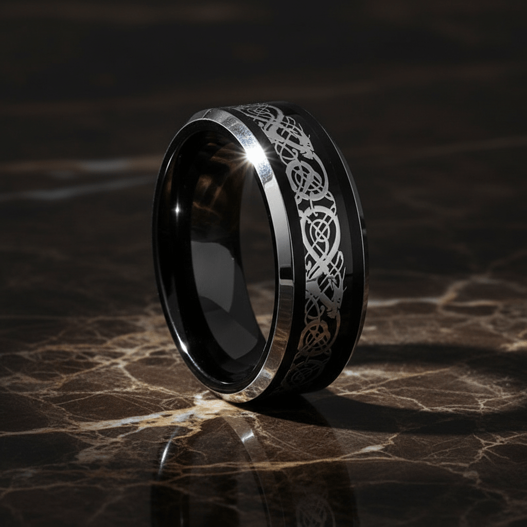 BETTLER — Luxury 3/4 angle on dark marble — men's tungsten wedding ring.