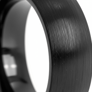 BLACKROCK — Extreme macro detail — men's tungsten wedding ring.