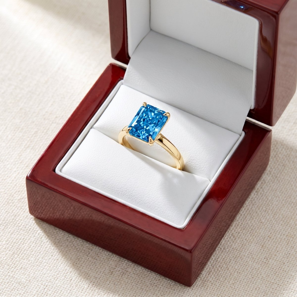 Blue Radiant lab-grown diamond solitaire engagement ring, Yellow Gold, in cherry-wood ring box