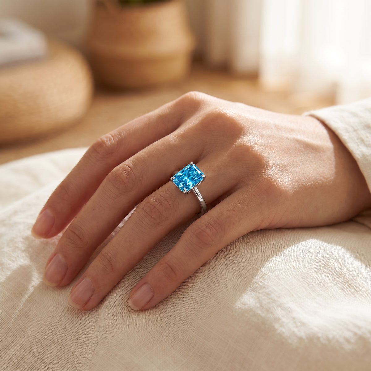 Blue Radiant lab-grown diamond solitaire engagement ring, 925 Sterling Silver, lifestyle photograph