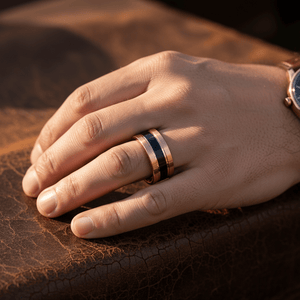 BRENTLEY — Lifestyle photo on hand — men's tungsten wedding ring.