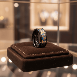 CARBULEUM — Premium boutique display on velvet — men's tungsten wedding ring.