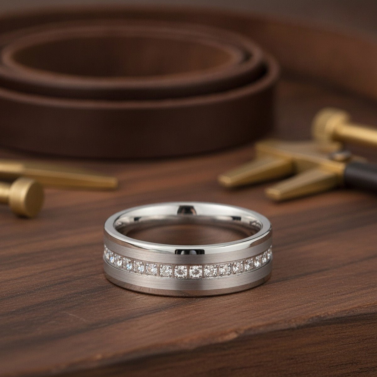 Aydins CEPHEUS | Silver Tungsten Ring, Diamond Stimulant CZ Eternity, Flat lifestyle scene, dark walnut workshop