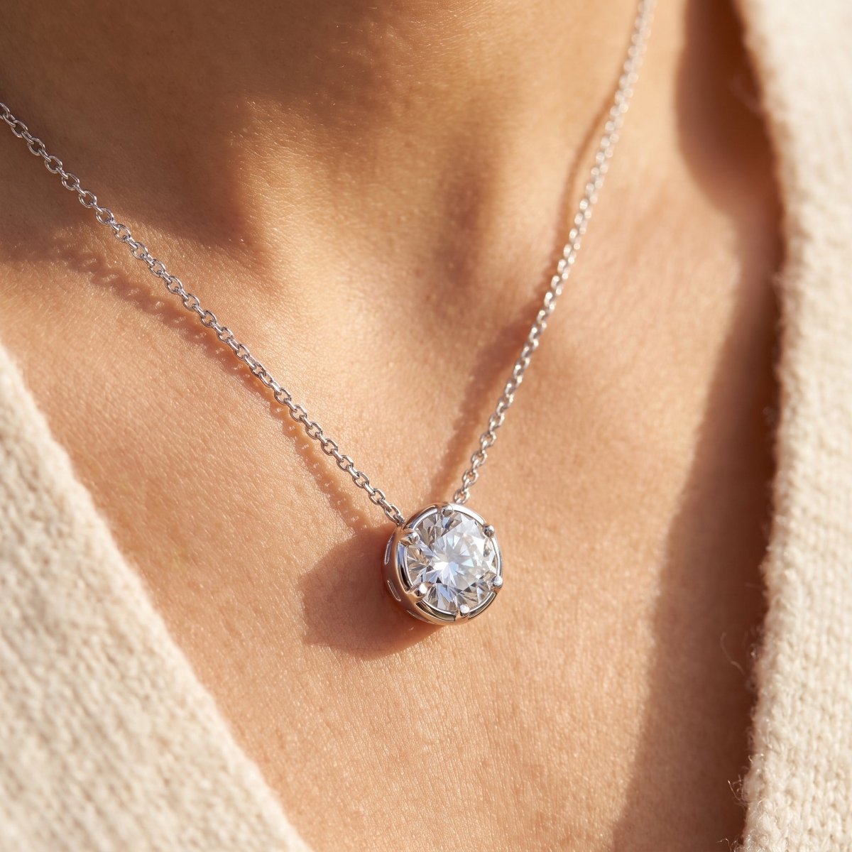 Classic Round Diamond Solitaire Necklace 925 silver lab grown diamond necklace being worn, natural daylight lifestyle photo