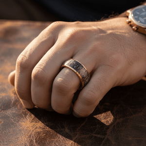 COLUMBA — Lifestyle photo on hand — men's tungsten wedding ring.