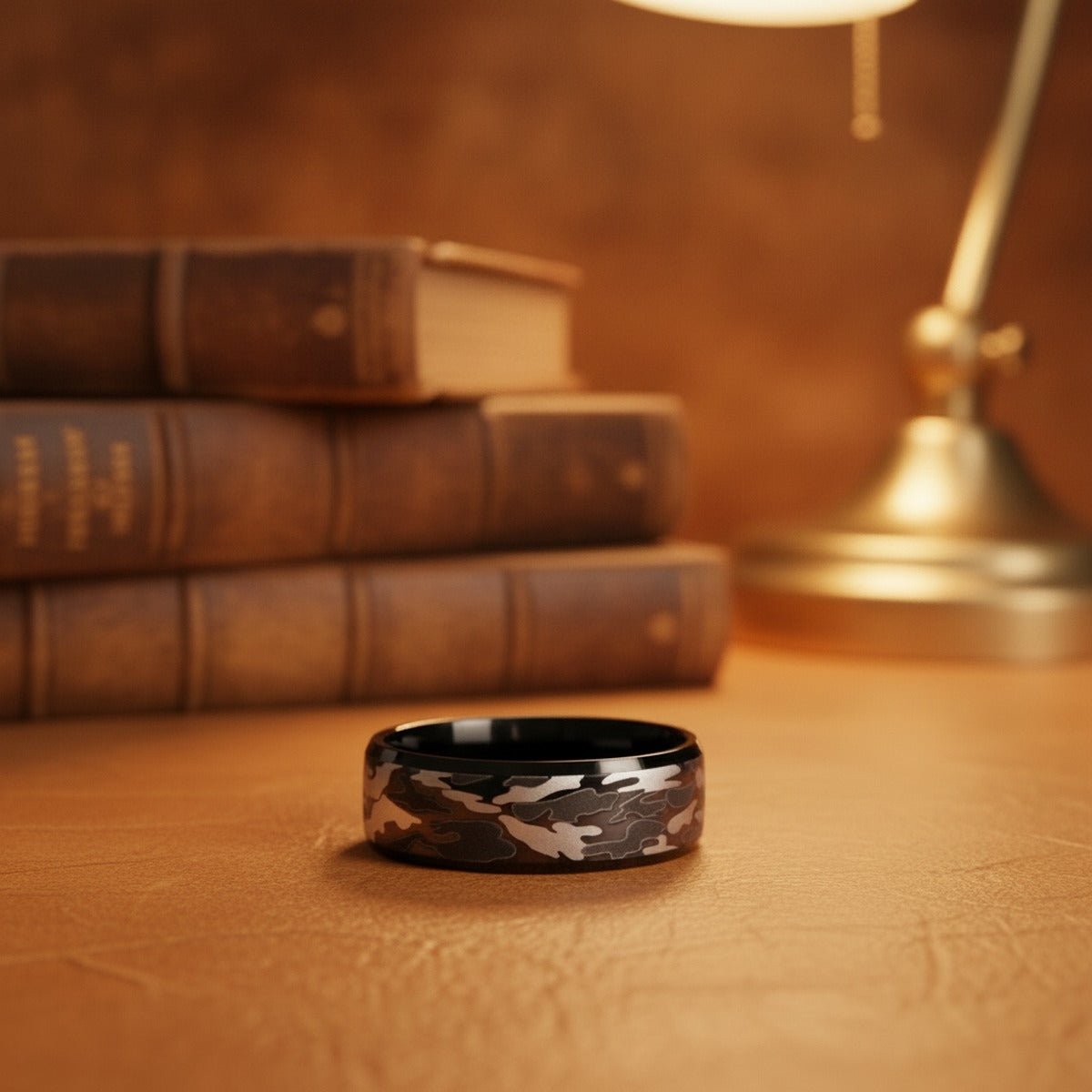 Aydins CONQUEST | Black Tungsten Carbide Ring, Camouflage Inlay lifestyle scene, leather library