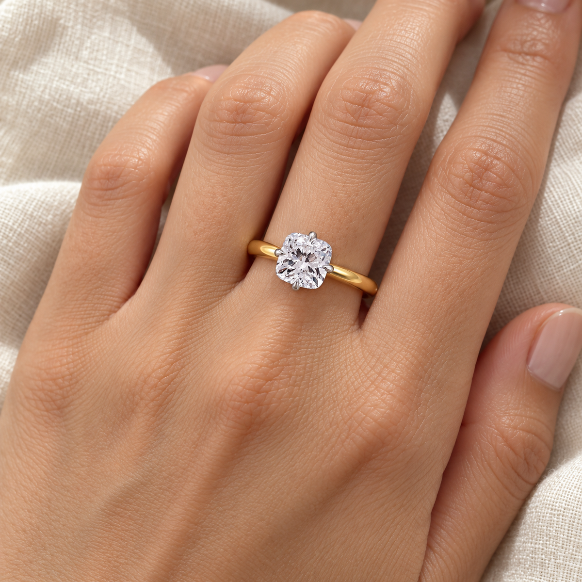 SYLVIE cushion lab-grown diamond ring in 14K two-tone gold, worn on hand, approx. 1 ct center