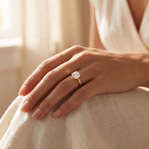 Cushion lab-grown diamond solitaire engagement ring, Yellow Gold, lifestyle photograph