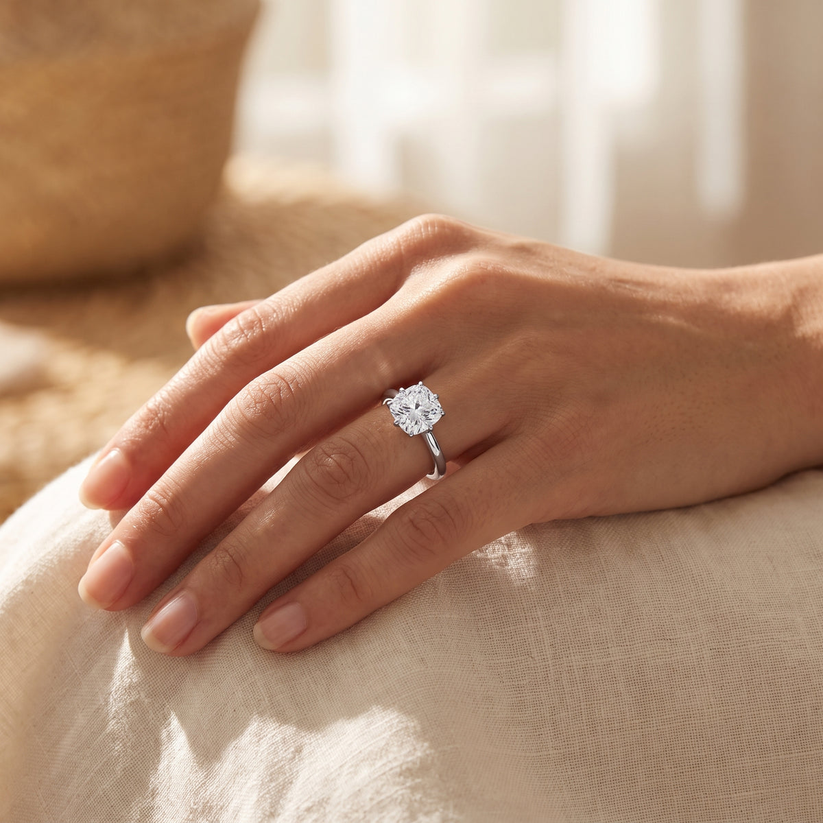 Cushion lab-grown diamond solitaire engagement ring, 925 Sterling Silver, lifestyle photograph