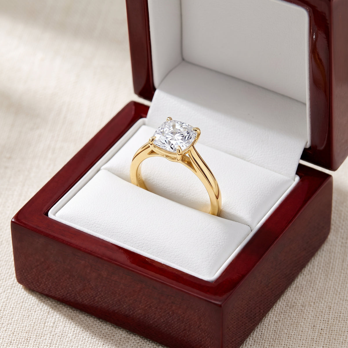 Cushion lab-grown diamond solitaire engagement ring, Yellow Gold, in cherry-wood ring box