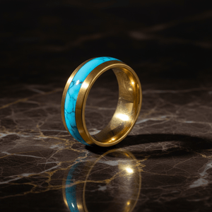 CYANITE — Luxury 3/4 angle on dark marble — men's tungsten wedding ring.
