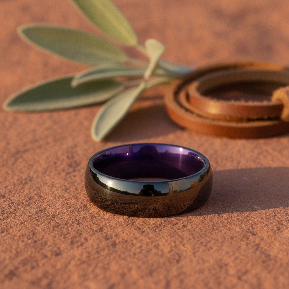 Aydins DAUER | Purple Ring, Black Tungsten Ring, Shiny, Domed lifestyle scene, red canyon rock