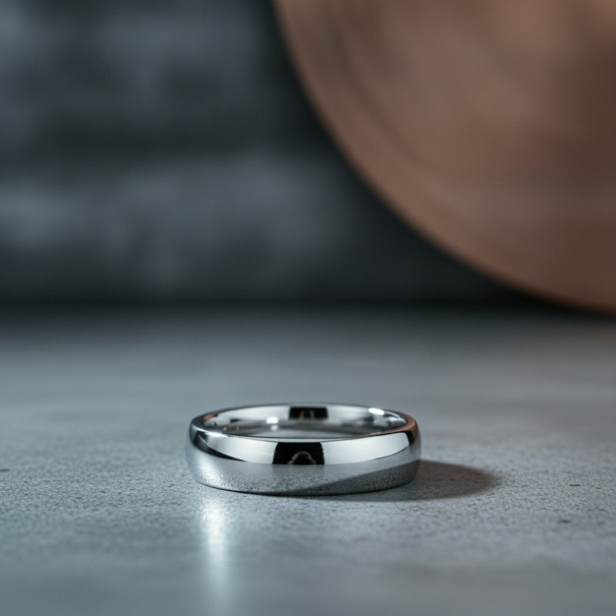 Aydins DOMINUS | Silver Tungsten Ring, Shiny Domed lifestyle scene, concrete industrial