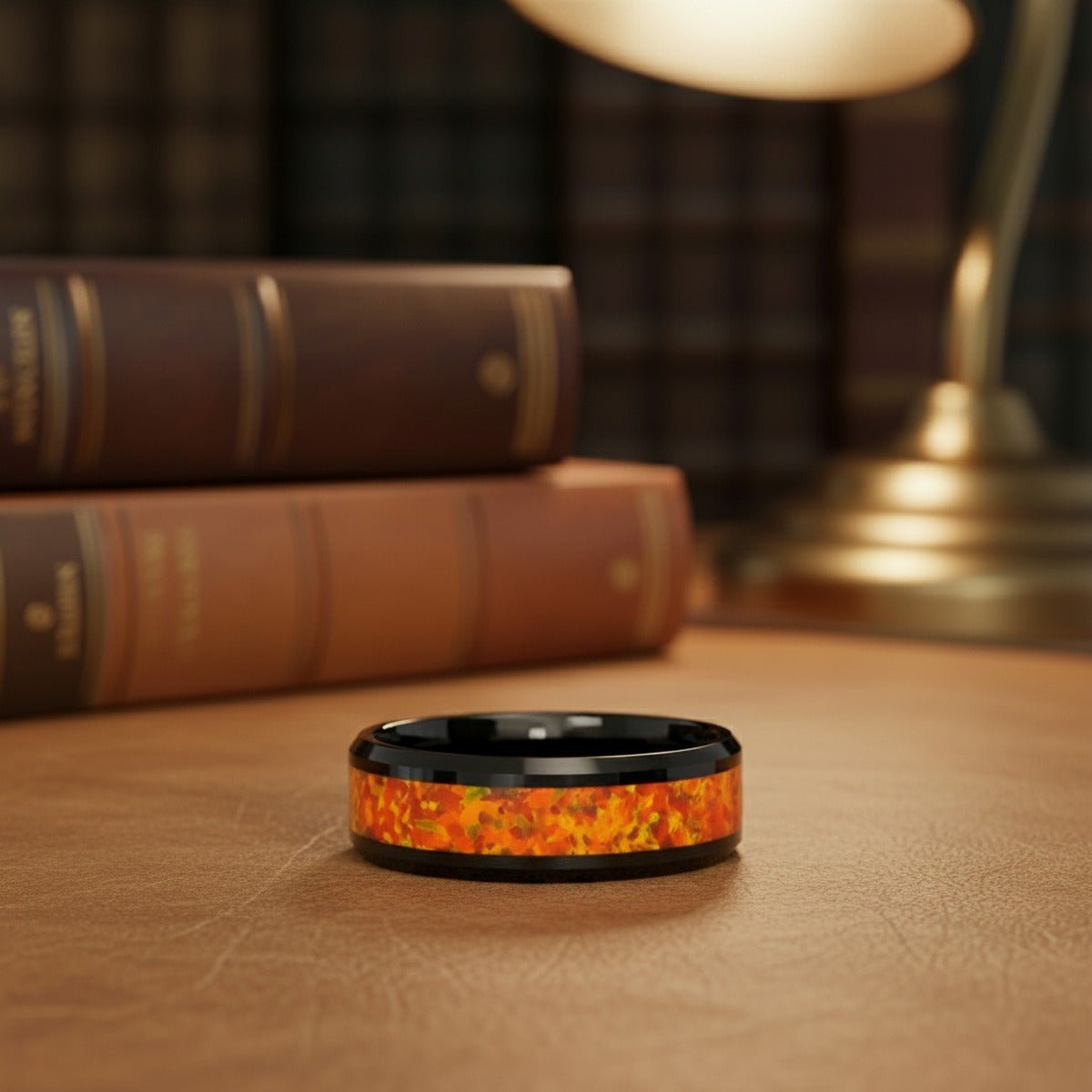 Aydins DRAGON | Polished Black Tungsten Orange Fire-Opal Domed Wedding Ring — 8mm lifestyle scene, leather library