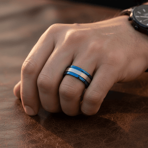 DUALWAVE — Lifestyle photo on hand — men's tungsten wedding ring.