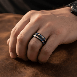 DUNLAP — Lifestyle photo on hand — men's tungsten wedding ring.
