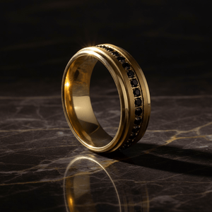 EBONYGLITZ — Luxury 3/4 angle on dark marble — men's tungsten wedding ring.