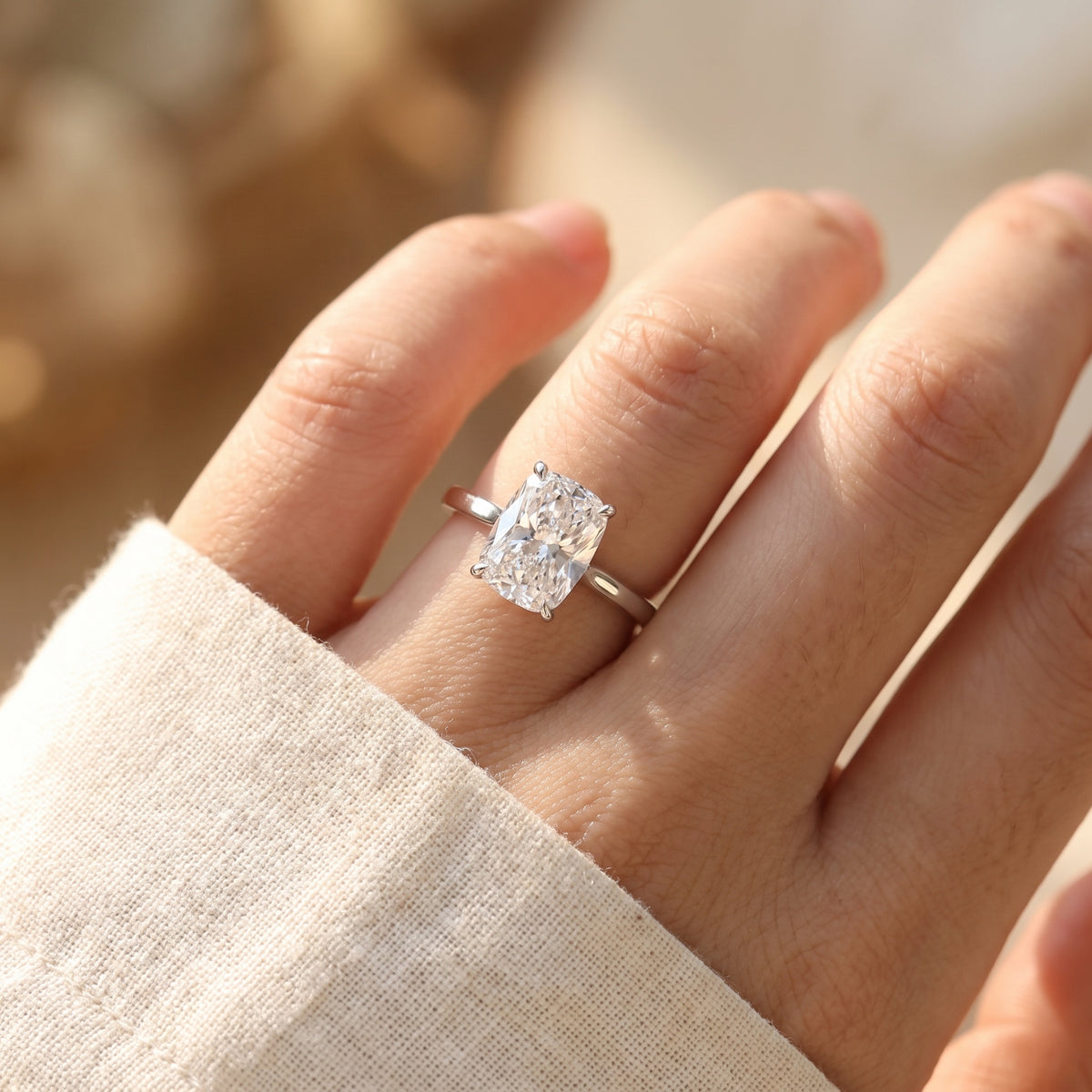 Elongated Cushion lab-grown diamond solitaire engagement ring, 925 Sterling Silver, lifestyle photograph
