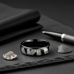 ELITIS — Editorial masculine still life — men's tungsten wedding ring.
