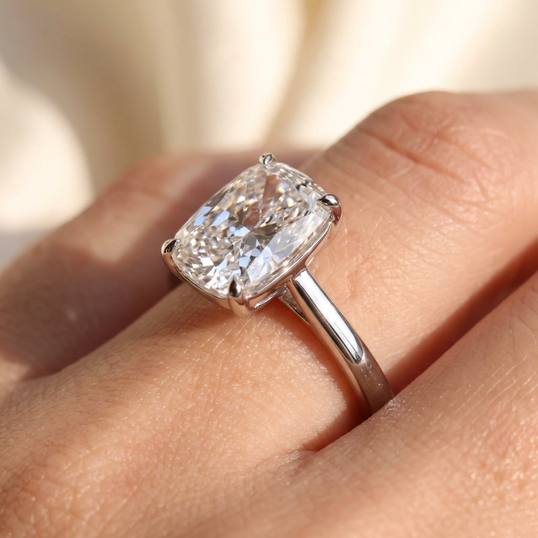 Elongated Cushion lab-grown diamond solitaire engagement ring, White Gold, on-finger close-up