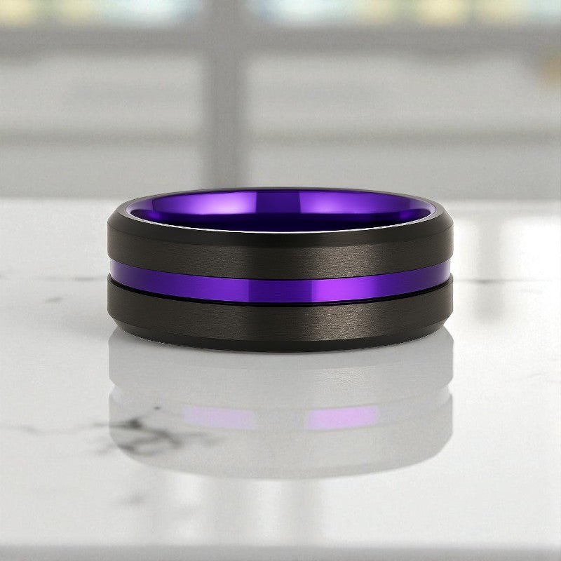 EMERY ring angled to show contrast between black exterior and purple core