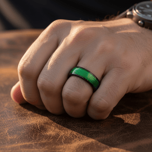 EVERGREEN — Lifestyle photo on hand — men's tungsten wedding ring.