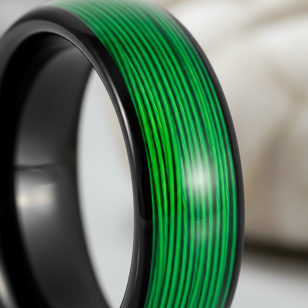 EVERGREEN — Extreme macro detail — men's tungsten wedding ring.