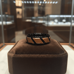 FISONE — Premium boutique display on velvet — men's tungsten wedding ring.