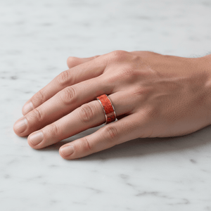 Red Opal inlay 14k yellow gold wedding band 8mm, on the hand