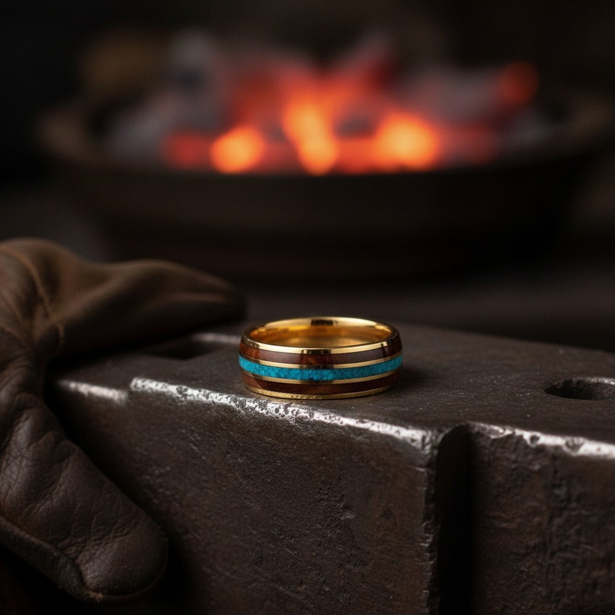 Aydins GUNNAR | Yellow Gold Tungsten Rosewood & Crushed Turquoise Inlay Domed Wedding Ring 8mm | Aydins lifestyle scene, blacksmith forge