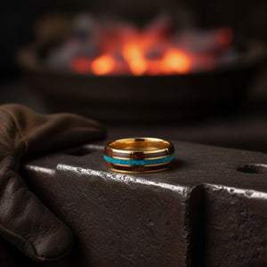 Aydins GUNNAR | Yellow Gold Tungsten Rosewood & Crushed Turquoise Inlay Domed Wedding Ring 8mm | Aydins lifestyle scene, blacksmith forge