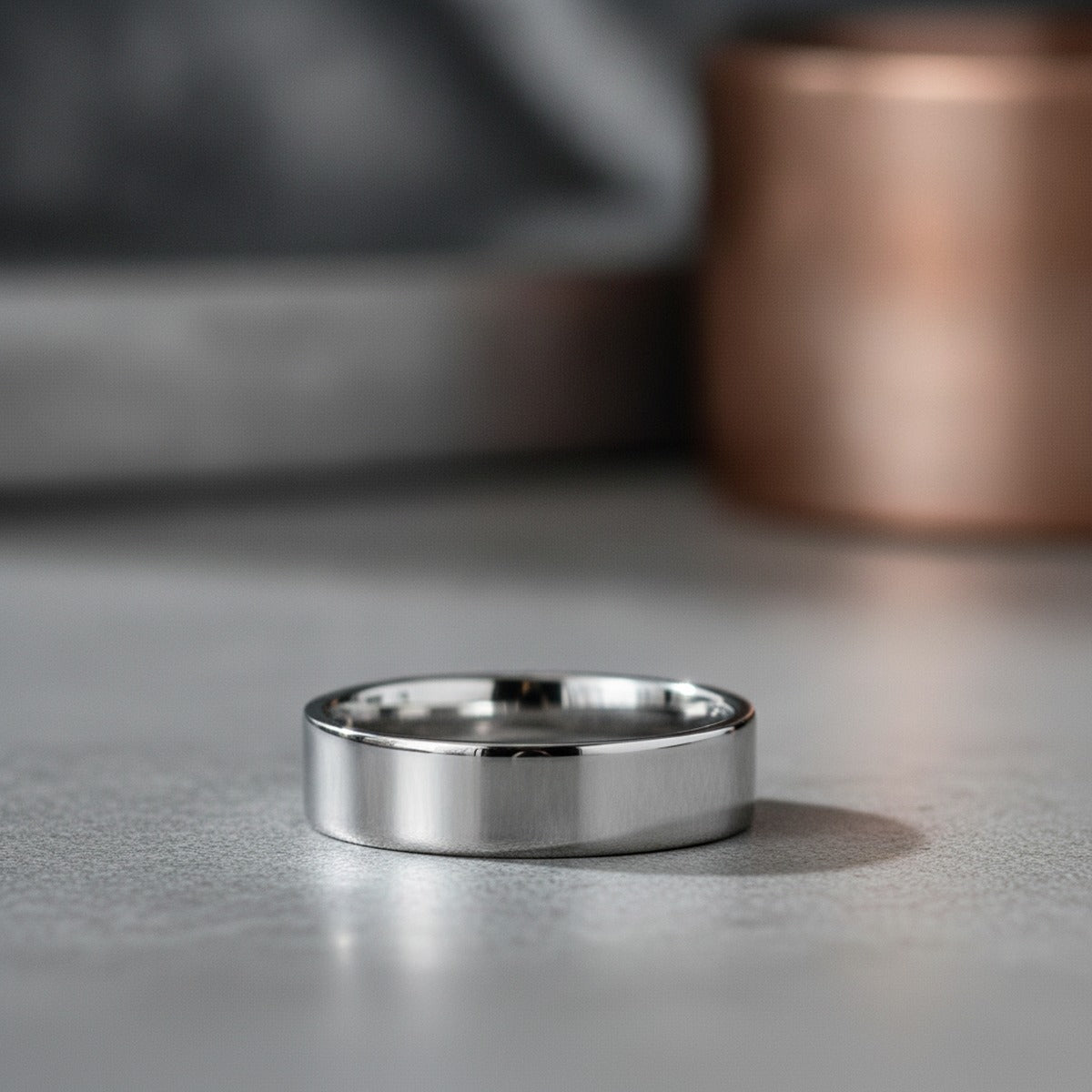 Aydins HARDY Polished Finish Flat Style Men’s Titanium Wedding Ring - 6mm & 8mm lifestyle scene, concrete industrial