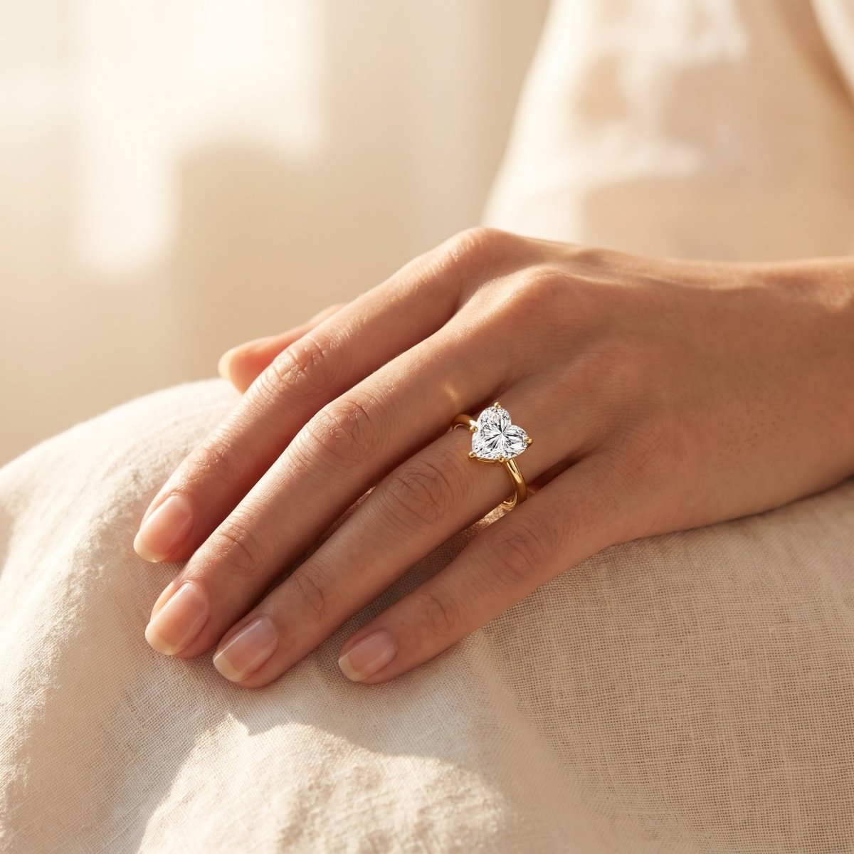 Heart lab-grown diamond solitaire engagement ring, Yellow Gold, lifestyle photograph