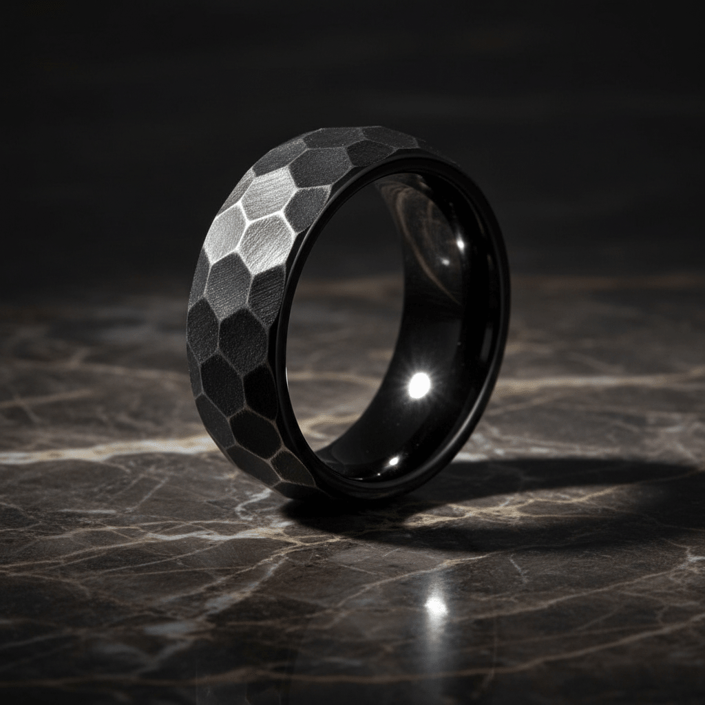 HEXANITE — Luxury 3/4 angle on dark marble — men's tungsten wedding ring.