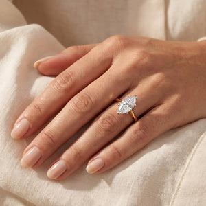 IMOGEN marquise lab-grown diamond ring in 10K two-tone gold, worn on the hand, approx. 1 ct center