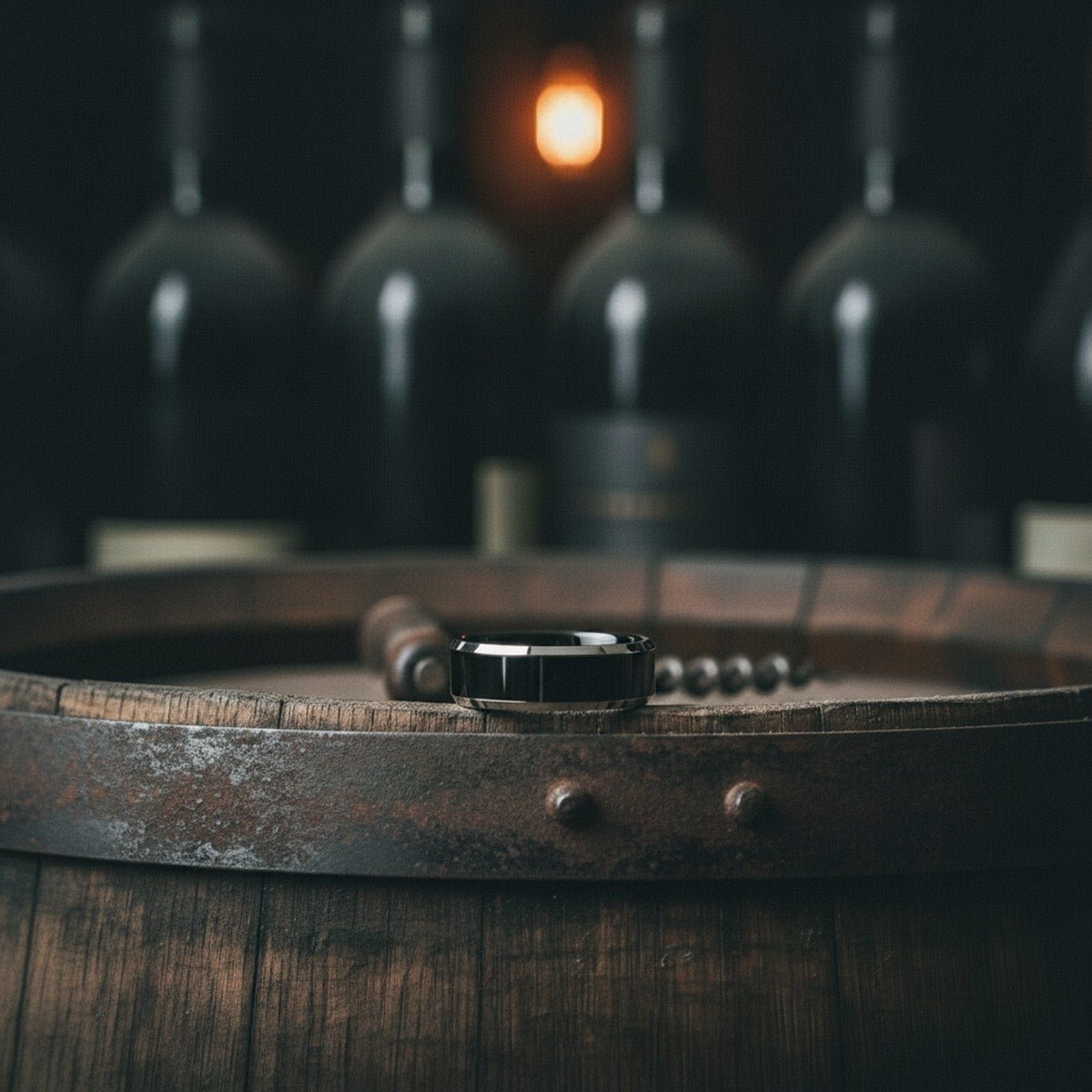 Aydins INFERNO | Black Tungsten Silver Edge Ring lifestyle scene, wine cellar oak