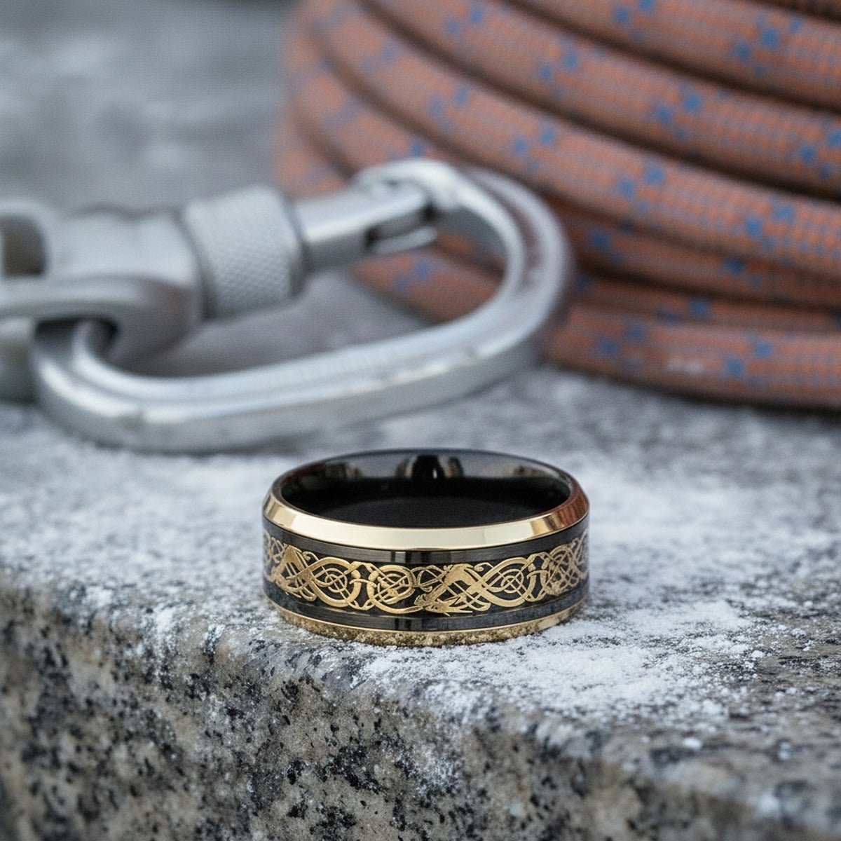 Aydins JETEK | Black Tungsten Ring, Gold Celtic Cut-Out Design, Gold Beveled lifestyle scene, climbing chalk